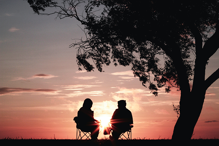 a couple enjoying the sunset